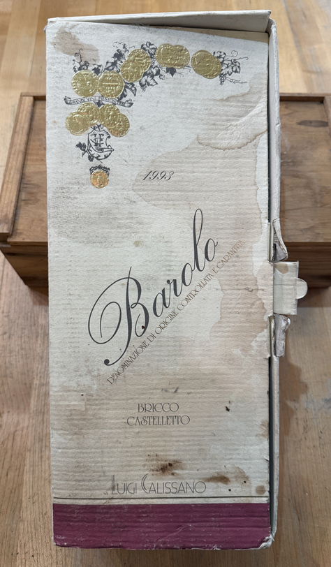 Wine box with 'Barolo' branding on a wooden surface