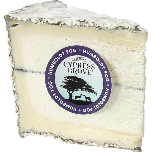 An upright wedge of white goat cheese with a line of ash at its center, a bloomy rind, and the Cypress Grove logo seal affixed to its side.