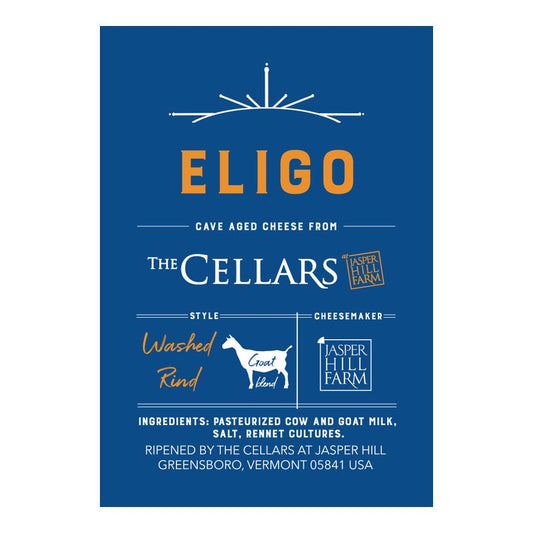 A blue rectangular label or package front with white and orange text reading ELIGO, plus The Cellars and Asper Hill Farm branding, on a white background.