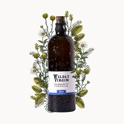 Bottle of the Doce olive oil From Wildly Virgin Olive Oil Company in southern Portugal. The bottle appears on a white background, with wild herbs resting behind the bottle.